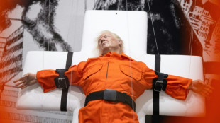 Sculpture of Trump strapped to a cross displayed in Switzerland