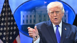 US stocks tumble on tariff fog, worries over AI