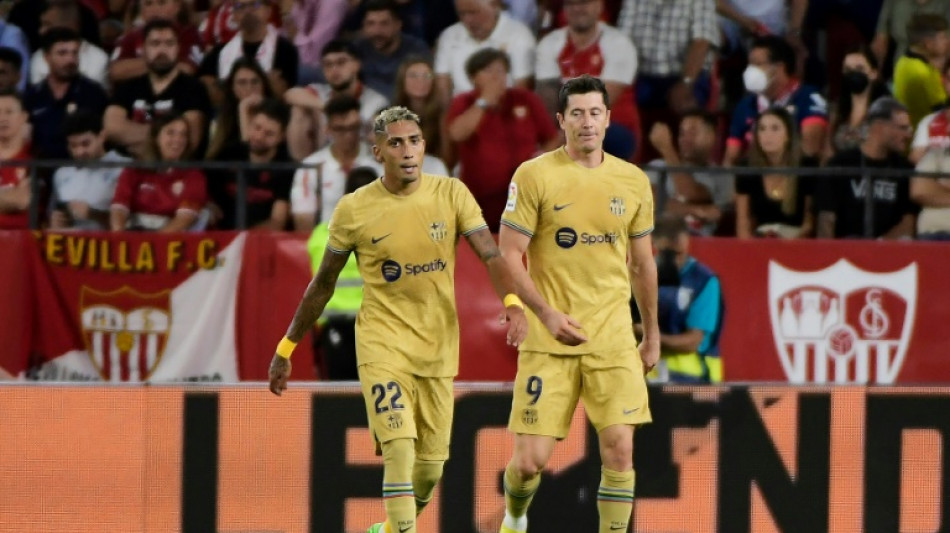 Lewandowski leads Barca to win at Sevilla as Real Madrid stay perfect