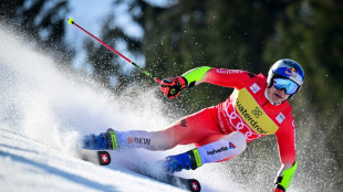 Odermatt wins giant slalom to seal World Cup overall title 