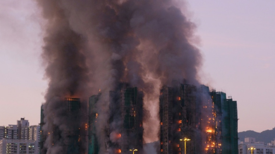 Fire engulfs Hong Kong residential blocks, killing at least four