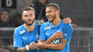 Clauss delivers as Marseille beat Angers climb to top of Ligue 1