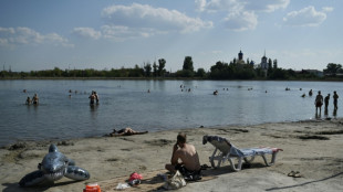 War-weary Ukrainians find solace by frontline lake