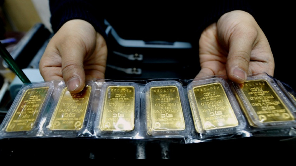 Vietnam jails former officials over gold bar graft: state media