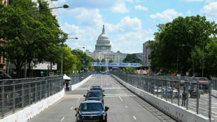 Trump takes starring role at Washington's IndyCar debut