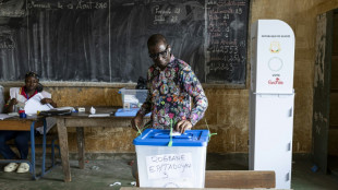 Guineans approve new constitution by wide margin, pave way for elections