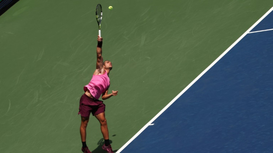 Alcaraz romps into US Open fourth round, injured Shelton exits