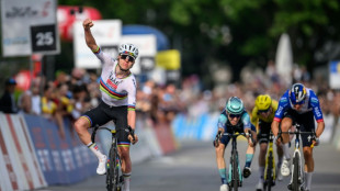 Pogacar wins opening full stage to take Tour de Romandie lead