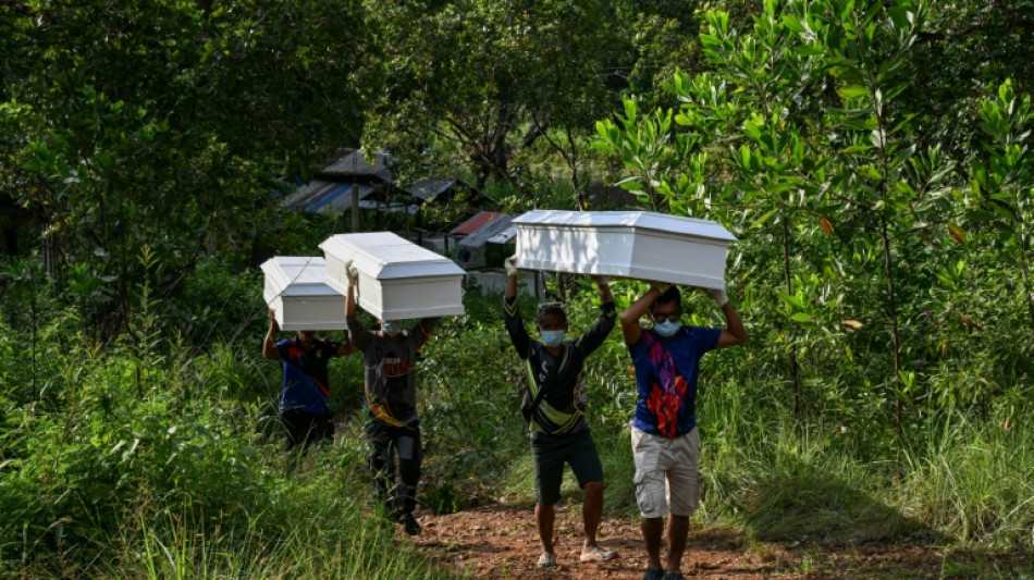 Bodies of Philippines ferry fire victims brought ashore as toll hits 35