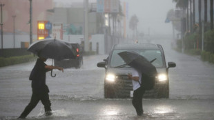 Flights scrapped, evacuations urged as Typhoon Dujuan nears Japan
