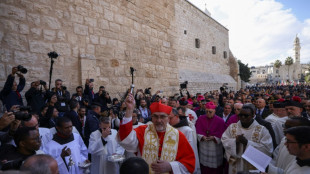 Bethlehem marks sombre Christmas under shadow of war