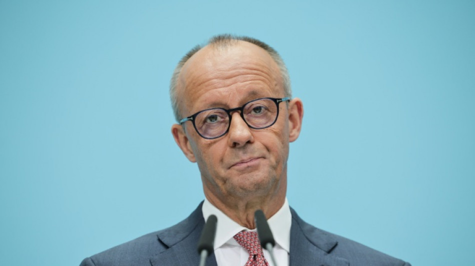 Embattled Merz vows to keep ruling for 'democratic future' of Germany