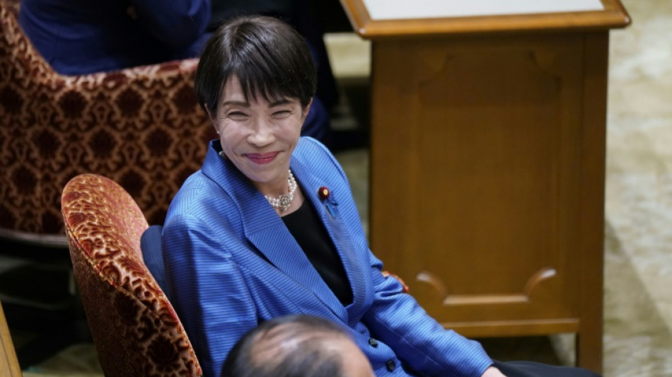 China, inflation could pop Japan PM's bubble