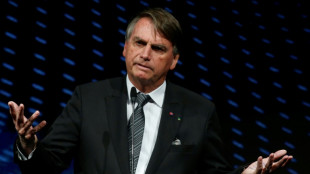 Bolsonaro se enzarza con reportera: "Tu marido vot&oacute; por m&iacute;"