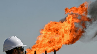 Oil surges to four-year high, stocks slip after Trump blockade warning