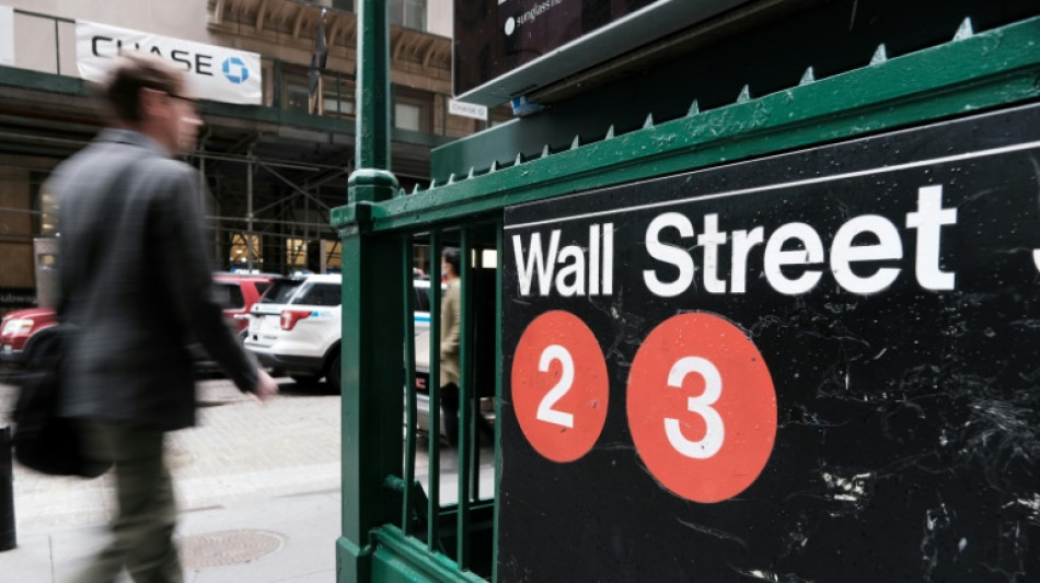 Wall Street conclut en hausse apr&egrave;s une Fed plus confiante dans son action